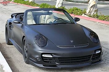 Чёрный-чёрный Porsche 911 Дэвида Бекхэма продан за $217 100