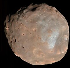 Фобос и Деймос: захваченные астероиды или обломки Марса?