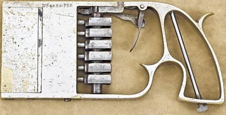 Пистолет для бумажника (11 фото)
