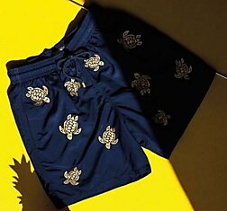 Шорты Golden Turtle Swim Trunks украшенные черепашками вышитыми золотыми нитками.