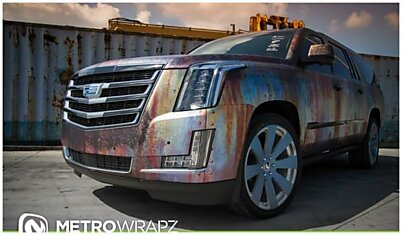 Cadillac Escalade обтянули вржавую; пленку